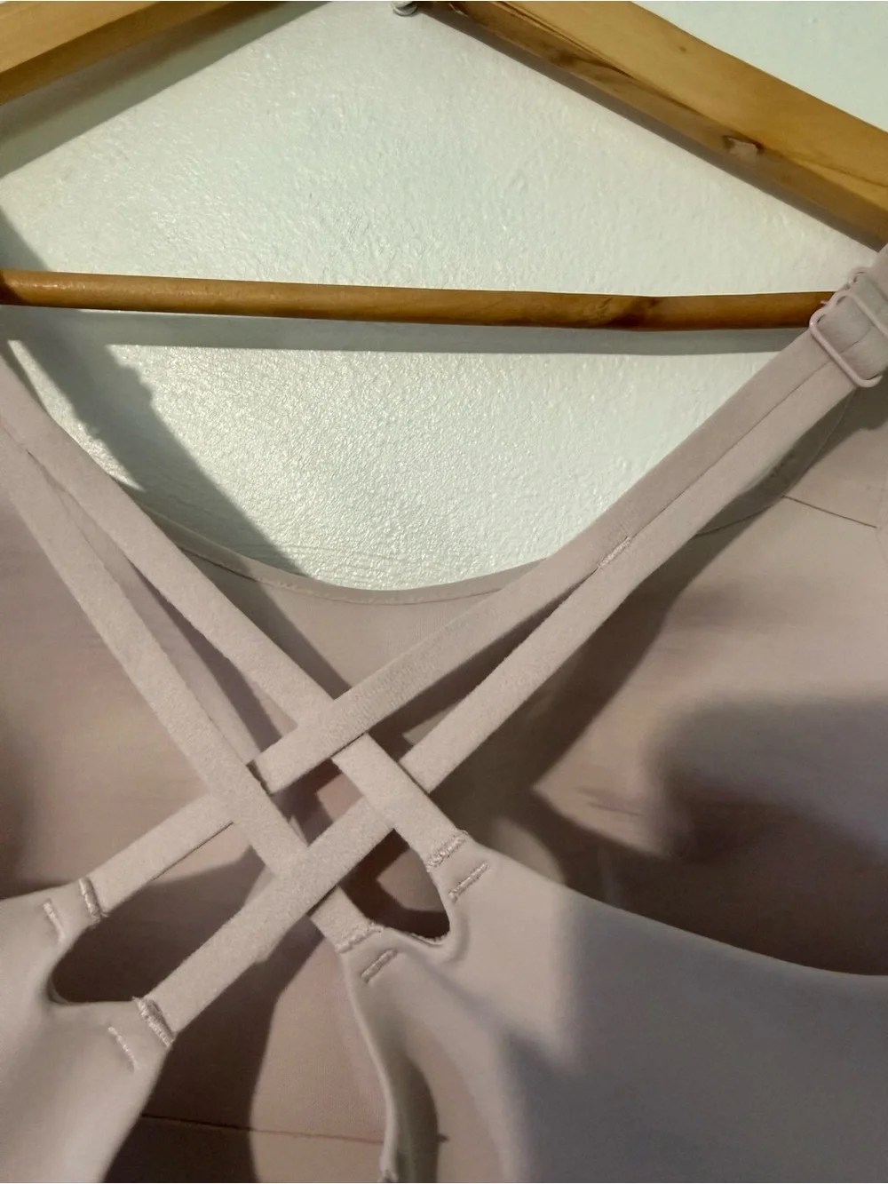 lululemon athletica blush pink Crisscross Back Sports Bra 34DD small flaw